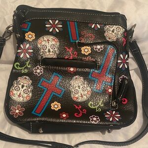 Black Crossbody Bag with Colorful Skull and Cross Design. Concealed Carry Bag